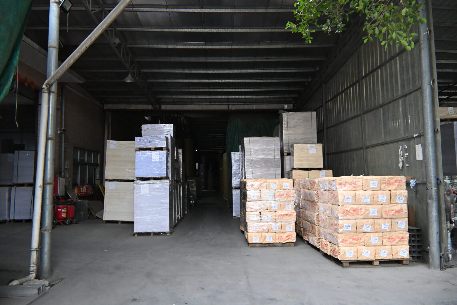 Paper stock and packed pallets in the GiltEdgePress warehouse